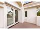 Balcony features glass doors and white stucco at 8117 Horizon Lake Dr, Las Vegas, NV 89128