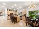 Open kitchen and breakfast nook area with granite counters, stainless appliances and lots of light at 8117 Horizon Lake Dr, Las Vegas, NV 89128