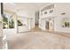 This living room offers natural light and leads to the second floor stairs and into the rest of the house at 8117 Horizon Lake Dr, Las Vegas, NV 89128