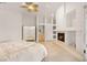 Bright main bedroom with a fireplace and open floor plan at 8117 Horizon Lake Dr, Las Vegas, NV 89128