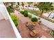 Upper view of the outdoor patio area with a firepit and lounge seating at 8117 Horizon Lake Dr, Las Vegas, NV 89128