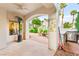 Outdoor patio features an overhead shade covering, ceiling fan, and built in BBQ at 8117 Horizon Lake Dr, Las Vegas, NV 89128