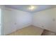 Bedroom with tiled floors, a small window and a door to a closet at 833 Bruce St, Las Vegas, NV 89101