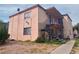 Two story home with a walkway and stairwell on the side of the home at 833 Bruce St, Las Vegas, NV 89101