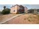 Two story home with a walkway and stairwell on the side of the home at 833 Bruce St, Las Vegas, NV 89101