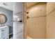 Bathroom featuring a shower, vanity and neutral tile work at 902 Little Raven St, Henderson, NV 89002