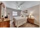 Comfortable bedroom with a cozy bed, neutral decor, and a window for natural light at 902 Little Raven St, Henderson, NV 89002
