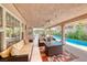 Cozy outdoor living space with comfy seating, a coffee table and a view of the pool at 902 Little Raven St, Henderson, NV 89002