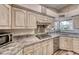 Well-appointed kitchen with granite countertops and stainless steel appliances at 902 Little Raven St, Henderson, NV 89002