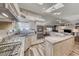 Beautiful kitchen features stainless appliances, granite counters, and modern lighting at 902 Little Raven St, Henderson, NV 89002