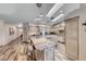 Bright kitchen with granite counters, stainless steel appliances, and skylights at 902 Little Raven St, Henderson, NV 89002