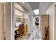 Cozy office nook with built-in shelves, skylight, and view into the next room at 902 Little Raven St, Henderson, NV 89002