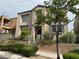 Charming two-story home featuring a well-maintained front yard and inviting entrance at 9145 Ebony Threads Ct, Las Vegas, NV 89149