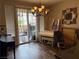 Bright living room with a piano, patio access, and contemporary decor at 9145 Ebony Threads Ct, Las Vegas, NV 89149