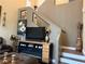 Cozy living room with a decorative fireplace and staircase at 9145 Ebony Threads Ct, Las Vegas, NV 89149