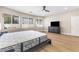 Bedroom featuring a large window, recessed lighting, and a sleek dresser at 9916 Dusty Winds Ave, Las Vegas, NV 89117