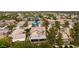 Aerial view of home nestled within a leafy neighborhood, showcasing the well-maintained landscaping and tranquil surroundings at 10381 Walking View Ct, Las Vegas, NV 89135