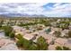 Residential neighborhood with mountain views and mature trees at 10381 Walking View Ct, Las Vegas, NV 89135