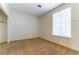 Cozy room with neutral carpet, window, and closet at 10381 Walking View Ct, Las Vegas, NV 89135