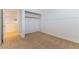 Bedroom with tan carpet and walk in closet at 10381 Walking View Ct, Las Vegas, NV 89135