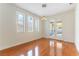 Dining room featuring hardwood floors, natural lighting, and outdoor access at 10381 Walking View Ct, Las Vegas, NV 89135