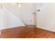 Inviting foyer with hardwood floors, a staircase, and double-door entrance at 10381 Walking View Ct, Las Vegas, NV 89135