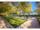 Enjoy a friendly game on this well-maintained bocce ball court surrounded by lush greenery at 10547 Grazia Ave, Las Vegas, NV 89135