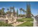 Siena Golf Club & Bistro sign nestled among towering palm trees and meticulously kept green lawns at 10547 Grazia Ave, Las Vegas, NV 89135