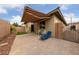 Paver patio and backyard featuring a retractable awning and outdoor seating at 10664 Mount Jefferson Ave, Las Vegas, NV 89166