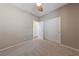 This bedroom features carpeted floors and a closet with sliding doors for storage at 10664 Mount Jefferson Ave, Las Vegas, NV 89166