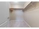 Spacious walk-in closet featuring carpeted floors and ample shelving at 10664 Mount Jefferson Ave, Las Vegas, NV 89166
