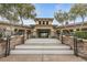 Community clubhouse with stone accents, elegant entry, and well-manicured landscaping at 10664 Mount Jefferson Ave, Las Vegas, NV 89166