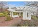 Inviting community pergola with white columns, bench seating, brick flooring, mature landscaping at 10664 Mount Jefferson Ave, Las Vegas, NV 89166