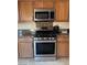 Modern kitchen with stainless steel range and plenty of storage at 10664 Mount Jefferson Ave, Las Vegas, NV 89166