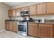 Gourmet kitchen with stainless steel appliances and ample cabinet space at 10664 Mount Jefferson Ave, Las Vegas, NV 89166