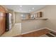 Open kitchen design with stainless steel appliances and a breakfast bar at 10664 Mount Jefferson Ave, Las Vegas, NV 89166
