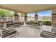 Relaxing outdoor lounge area with comfortable seating, perfect for socializing and enjoying the outdoors at 10664 Mount Jefferson Ave, Las Vegas, NV 89166