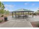 Spacious community picnic area with a large awning and multiple picnic tables at 10664 Mount Jefferson Ave, Las Vegas, NV 89166