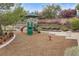 Community playground with play structure and soft mulch ground cover, perfect for  at 10664 Mount Jefferson Ave, Las Vegas, NV 89166
