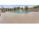 Community pool with lounge chairs, providing a relaxing amenity for residents at 10664 Mount Jefferson Ave, Las Vegas, NV 89166