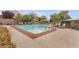 Sparkling community pool with lounge chairs, an ideal spot for relaxation at 10664 Mount Jefferson Ave, Las Vegas, NV 89166