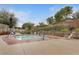 Relaxing community spa with nearby lounge chairs and landscaped surroundings at 10664 Mount Jefferson Ave, Las Vegas, NV 89166