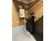 Garage featuring tankless water heater and water filtration system at 10664 Mount Jefferson Ave, Las Vegas, NV 89166