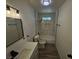Beautifully renovated bathroom with modern fixtures, lighting, and vanity at 1083 E Calvada Blvd, Pahrump, NV 89048