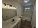 Beautifully renovated bathroom with modern fixtures, lighting, and vanity at 1083 E Calvada Blvd, Pahrump, NV 89048