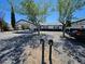 Inviting exterior view featuring two mailboxes in front of the single story home and a car port at 1083 E Calvada Blvd, Pahrump, NV 89048