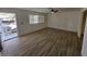 This cozy living room features durable modern flooring and an exterior entrance at 1083 E Calvada Blvd, Pahrump, NV 89048