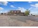 Wide view of a ranch-style home showing large yard and exterior spaces at 11875 Maggie Ave, Las Vegas, NV 89166