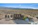 Charming country home with covered porch, desert landscaping, and views of surrounding mountains at 11875 Maggie Ave, Las Vegas, NV 89166