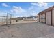 Horse trailer parked near a barn and a horse shelter at 11875 Maggie Ave, Las Vegas, NV 89166